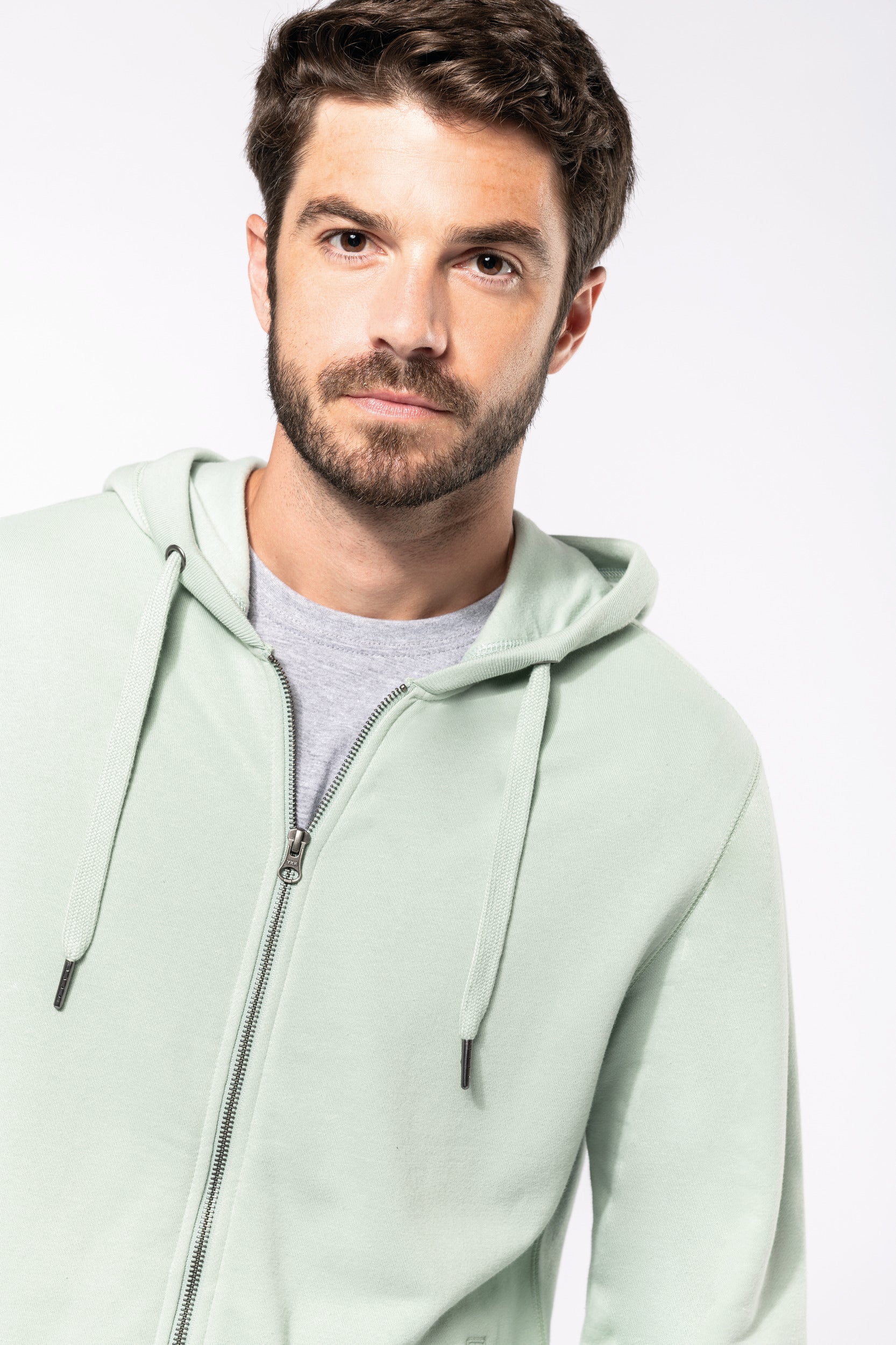 Uniseks ecologisch verantwoord French Terry sweatshirt met capuchon en rits