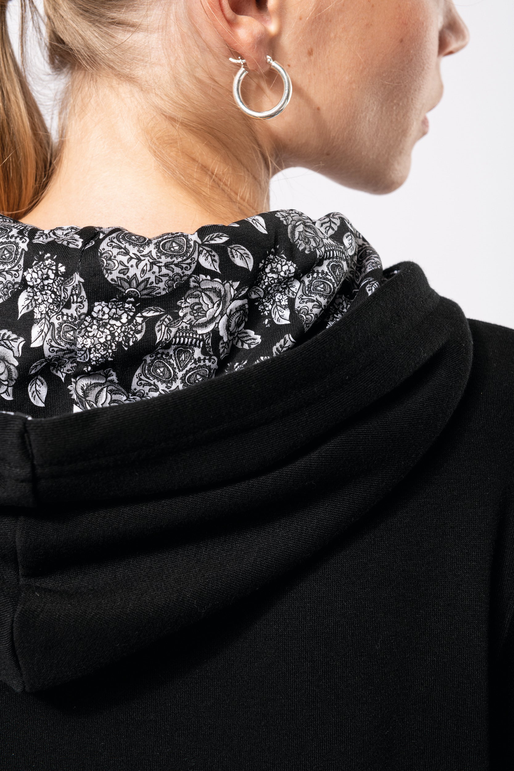 Uniseks sweatshirt met capuchon en contrasterend patroon